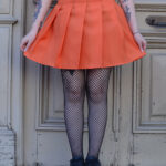 Pollera tablas naranja lisa