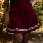 Pollera tablas bordo con linea blanca